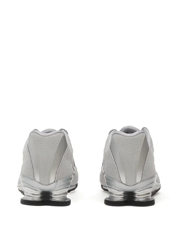 Nike
baskets Shox Z à logo métallisé