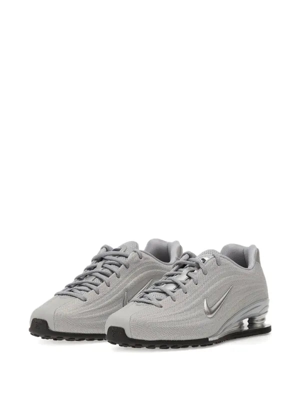 Nike
baskets Shox Z à logo métallisé