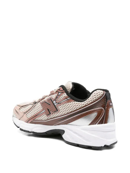 New Balance
baskets à empiècements en mesh